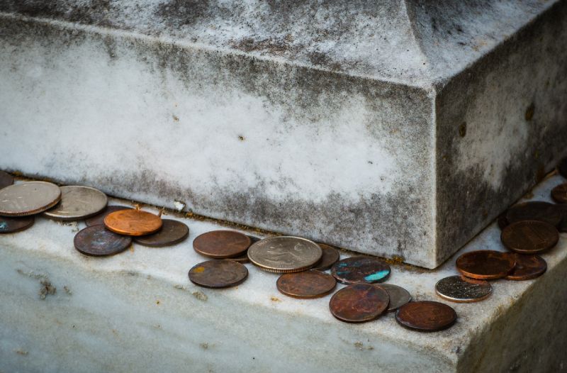 Leave Behind A Coin On A Grave