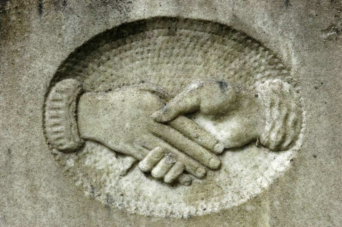 Clasped Hands on a grave marker