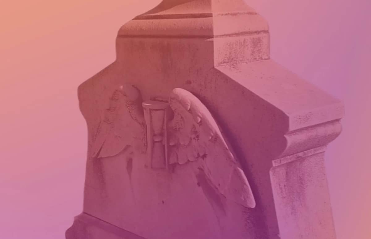 Hourglasses With Wings on grave marker